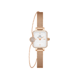 Rose gold Quadro Mini Lumine watch with a rectangular white dial, pavé crystal bezel, and matching mesh strap, paired with an adjustable pavé crystal pendant bracelet featuring a sparkling charm.