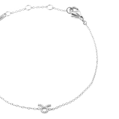 Close-up of the Crystal Zodiac Chain Bracelet Silver with a Taurus zodiac charm set with sparkling crystals and an adjustable fine chain.
