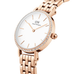 Close-up of the Petite Lumine Bezel 5-Link Melrose watch showing its rose gold 5-link bracelet, crisp white dial, and sparkling gemstone bezel, highlighting its elegant and refined design for women.