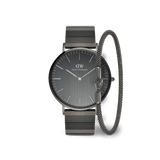 Classic Piano Link Graphite Unitone & Mesh Bracelet Set featuring a graphite coloured stainless steel watch with a minimalist round dial and an adjustable mesh bracelet, both designed for a sleek, modern look.