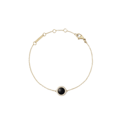 Delicate gold bracelet featuring a slim adjustable chain, a round black agate stone pendant framed by sparkling white crystals, and a secure lobster clasp.