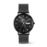 Classic Day Display Onyx Black men’s watch with a 40mm black dial, subtle semi-transparent triangle pattern, clear day and date display, and a black mesh stainless steel strap.