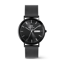 Classic Day Display Onyx Black men’s watch with a 40mm black dial, subtle semi-transparent triangle pattern, clear day and date display, and a black mesh stainless steel strap.