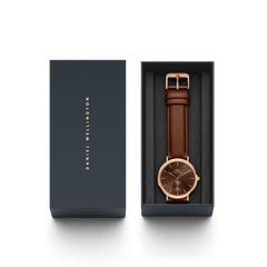 Classic Multi-Eye St Mawes Amber Rose Gold men's watch presented in a sleek Daniel Wellington gift box, featuring a rose gold case, amber brown dial, and genuine brown leather strap, ideal for gifting or everyday wear.