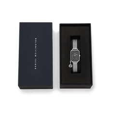 Daniel Wellington Quadro Crystal Zodiac Sterling Set presented in its gift box, featuring a silver mesh strap, rectangular crystal-framed case, black mother of pearl dial, and a sparkling zodiac charm.