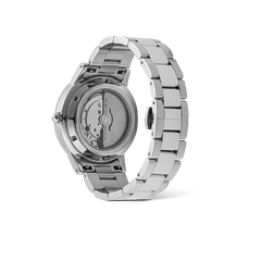 Daniel Wellington Iconic Link Automatic Silver men’s watch showing the exhibition case back, revealing the automatic movement and polished stainless steel bracelet.