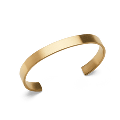 Line Cuff Brushed Gold displays a slim, open cuff bracelet in brushed gold-tone stainless steel, featuring a minimalist design and smooth, contoured edges.