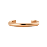 Polished rose gold Arch Cuff bracelet with a rounded 6mm profile, featuring a smooth, unbranded exterior and an open-ended, adjustable design.