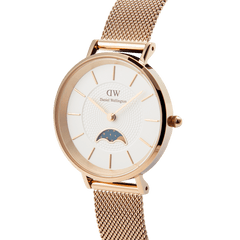 Petite Lune Melrose ladies watch in rose gold with a slim mesh strap, white textured dial, and a distinctive moon-phase sub-dial, offering a refined look for everyday wear.