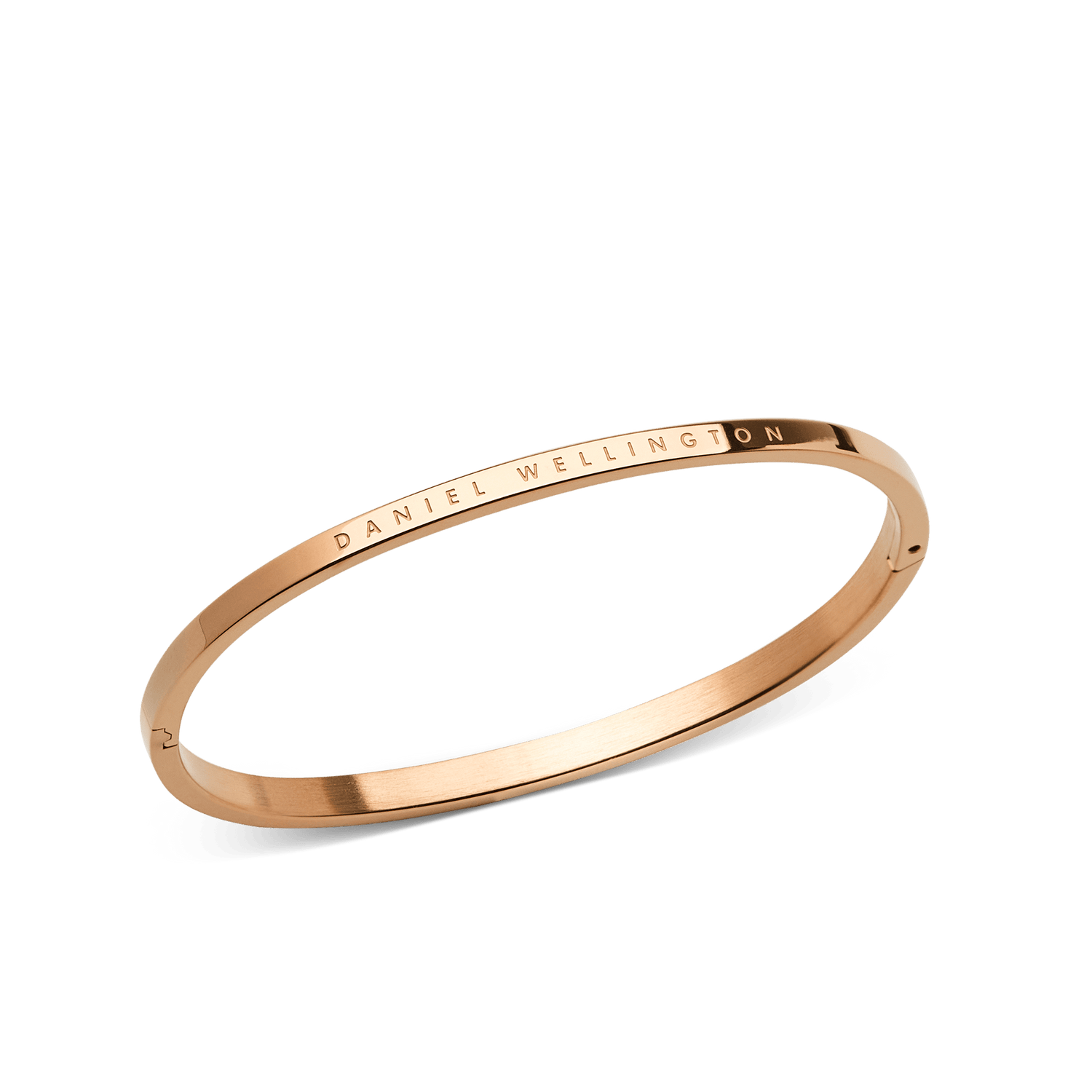 Classic Bangle Rose Gold featuring a slim, polished rose gold finish with the DANIEL WELLINGTON logo engraved on the outer edge, highlighting its minimalist and elegant design.