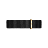 Cornwall Strap Gold showcases a black polyester NATO watch strap with a sleek gold buckle, offering a minimalist and versatile style suitable for both casual and formal wear.