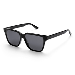 Rectangular Bio-Acetate Black sunglasses with a bold black oversized frame, UV400 nylon lenses, and Daniel Wellington branding on the temples, offering a stylish and contemporary look for men.