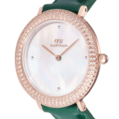 Close-up of the Crystalline Bezel Green Croc Rose Gold ladies watch, featuring a rose gold-plated case with a crystal-set bezel, white mother of pearl dial, and emerald green crocodile-embossed leather strap.