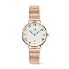 Petite Roman Numerals Date Rose Gold ladies watch with a 28mm rose gold case, white guilloché-patterned dial featuring blue hands, Roman numerals, a date window at 6 o’clock, and a slim rose gold mesh strap.