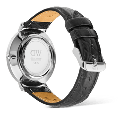 Back view of the Classic Roman Numerals Date Black Croc Belly Silver watch, highlighting the polished stainless steel case, engraved case back, and black croc-embossed leather strap with a silver pin buckle.