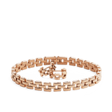 Rose gold jewellery set featuring a three-link chain bracelet and matching earrings, both with a polished, modern design and warm metallic finish.