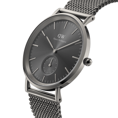 Classic Multi-Eye Mesh Graphite men's watch with a graphite sunray dial, minimalist markers, and a stainless steel mesh strap, shown from a side angle to highlight its sleek case and modern design.