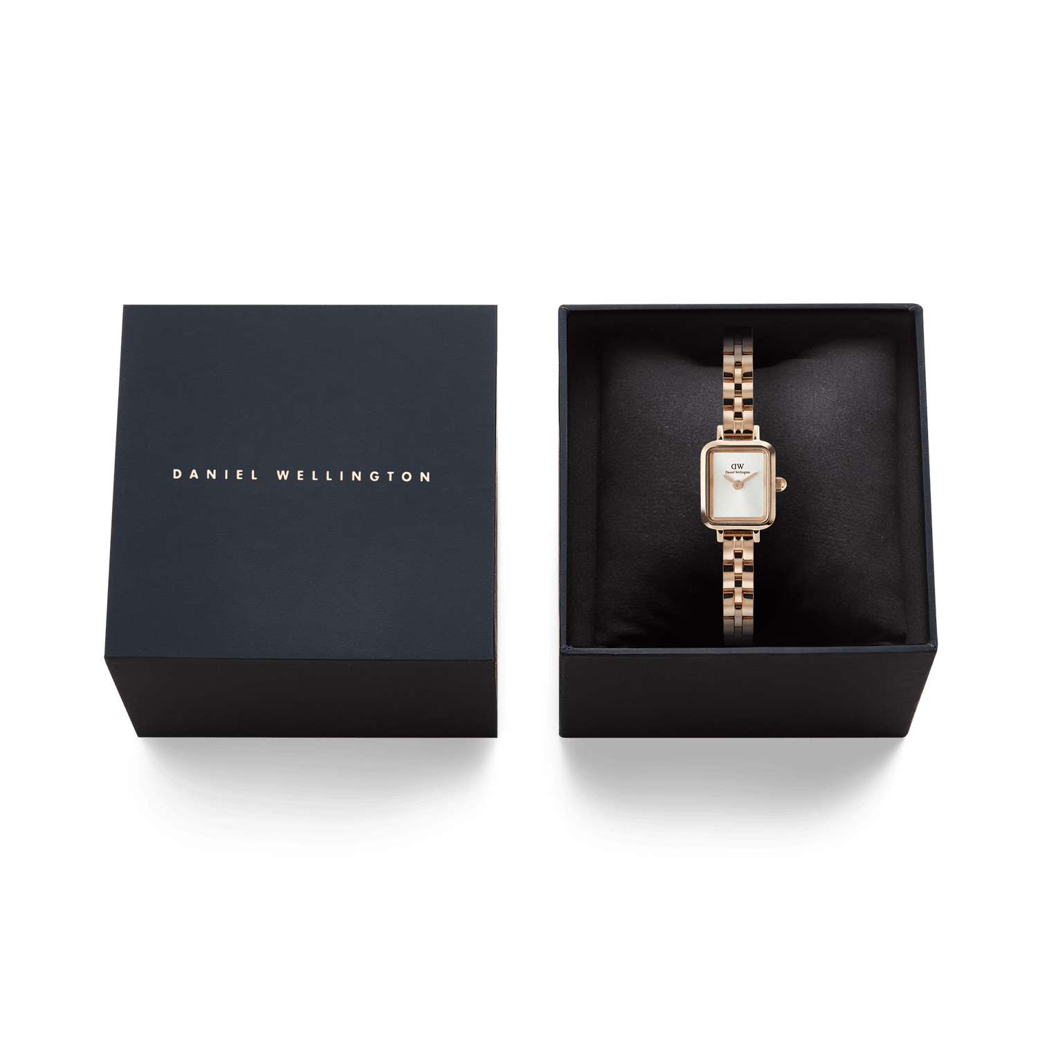 Quadro Mini Arch 3-link White Sunray Rose Gold watch presented in a Daniel Wellington gift box, featuring a petite rectangular case and polished rose gold bracelet.