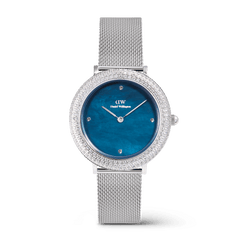 Daniel Wellington Crystalline Bezel Sterling Blue ladies watch with a blue mother of pearl dial, crystal-set bezel, and a polished silver stainless steel mesh strap.
