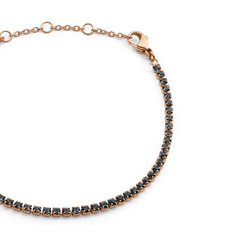Close-up of the Classic Tennis Bracelet Nightfall Rose Gold, highlighting the row of dark Preciosa crystals set in rose gold with an adjustable chain and lobster clasp for a secure, elegant fit.