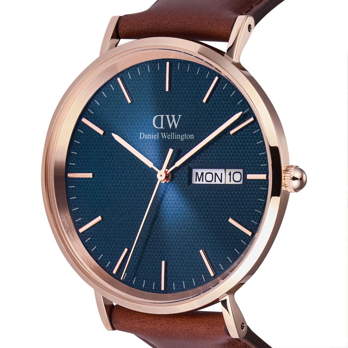 Close-up of the Classic Day Display St Mawes Rose Gold Arctic watch, highlighting the blue textured dial, rose gold case, and day and date window, paired with a brown leather strap.