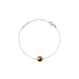 Delicate silver bracelet with an adjustable fine chain, featuring a central tiger eye gemstone framed by a halo of white cubic zirconia and a secure lobster clasp.