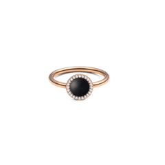 Rose gold ring featuring a round black agate centre stone surrounded by a halo of white crystals, set on a slim, polished band.