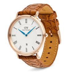 Classic Roman Numerals Date Light Brown Croc Belly Rose Gold men’s watch with a rose gold case, white dial, black Roman numerals, blue hands, date display at six o’clock, and a light brown croc-embossed leather strap with pin buckle closure.
