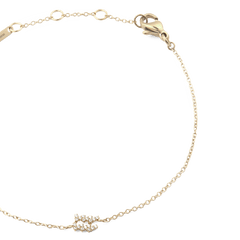 Crystal Zodiac Chain Bracelet Gold featuring a slim gold chain, adjustable sizing rings, and a sparkling crystal zodiac charm, finished with a lobster clasp for comfortable wear.