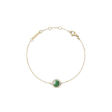 Delicate gold bracelet featuring a domed jade centrepiece surrounded by a halo of cubic zirconia, set on a fine adjustable gold chain with a secure lobster clasp.