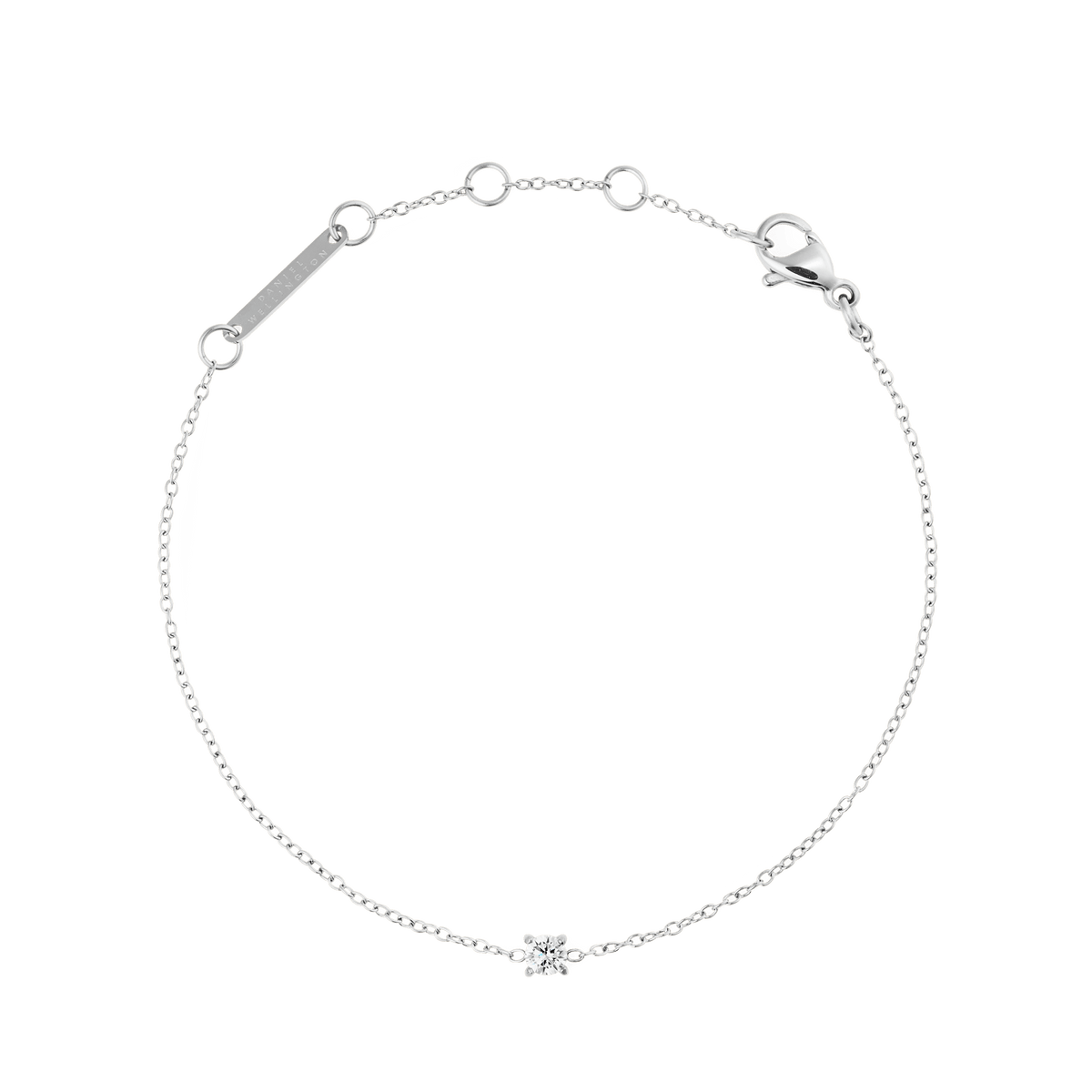 Delicate silver bracelet with a fine adjustable chain, featuring a single cubic zirconia crystal as the centrepiece and a secure lobster clasp, designed for a refined and timeless look.