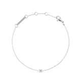 Delicate silver bracelet with a fine adjustable chain, featuring a single cubic zirconia crystal as the centrepiece and a secure lobster clasp, designed for a refined and timeless look.