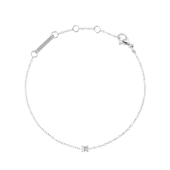 Delicate silver bracelet with a fine adjustable chain, featuring a single cubic zirconia crystal as the centrepiece and a secure lobster clasp, designed for a refined and timeless look.