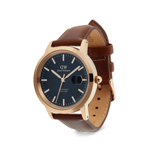 Iconic St Mawes Automatic Rose Gold watch with a blue enamel dial, rose gold-plated stainless steel case, and brown Italian leather strap, featuring luminous markers and a date window.