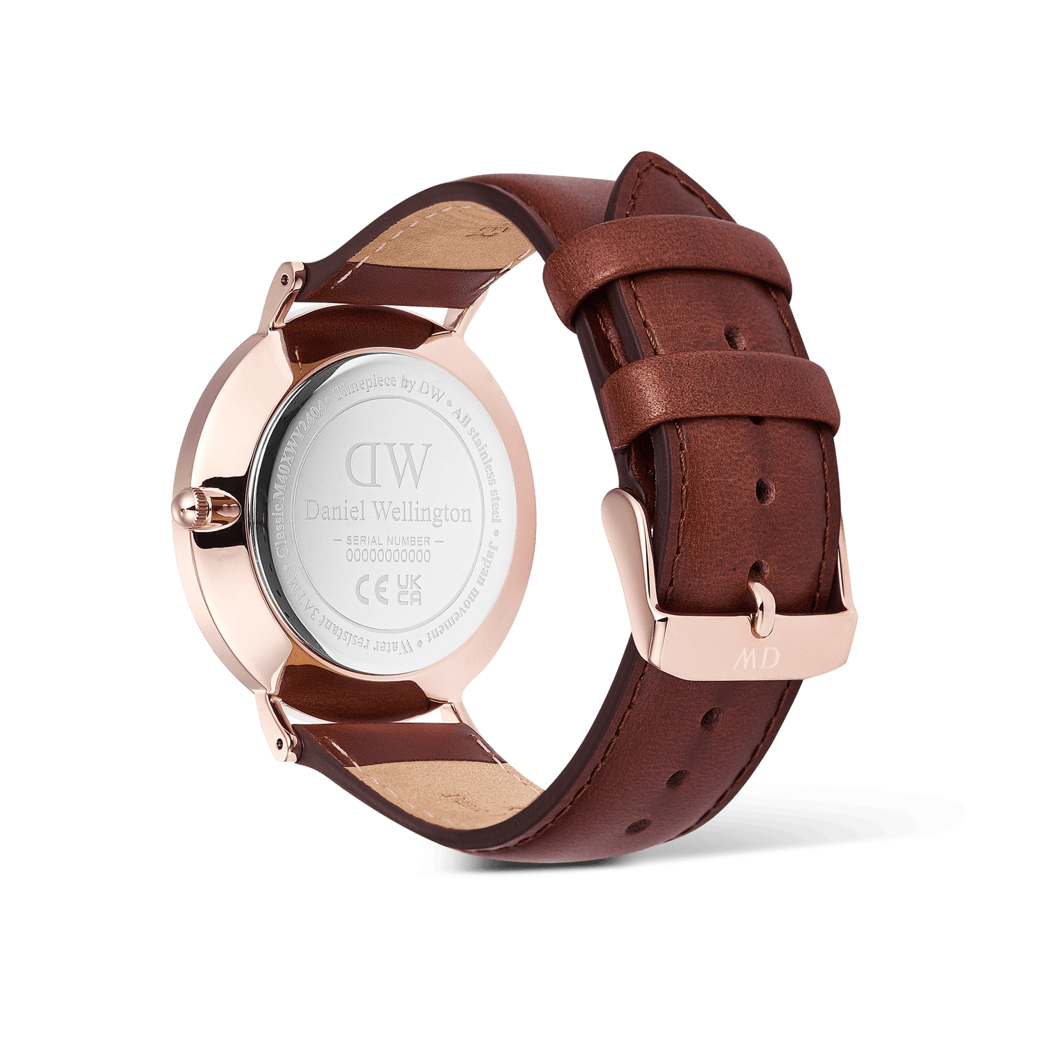 Close-up of the Classic Day Display St Mawes Rose Gold Arctic watch showing the engraved stainless steel case back, rose gold detailing, and brown genuine leather strap with a rose gold buckle.
