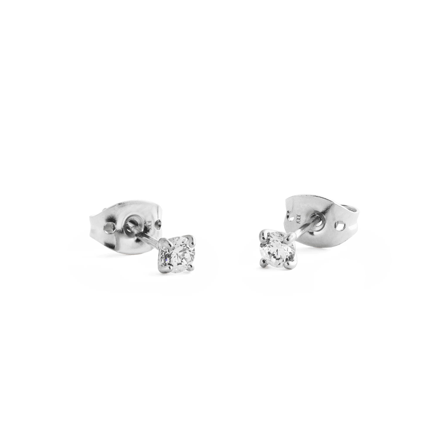 Mirelle Solitaire Stud Earring Silver shown with secure butterfly backs, featuring petite round white cubic zirconia crystals set in polished silver for a minimalist and comfortable everyday style.