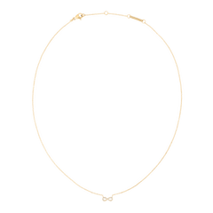 Thin gold chain necklace featuring a delicate infinity pendant set with white cubic zirconia crystals, designed for minimalist style and everyday elegance.