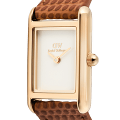 Close-up of the Daniel Wellington Bound Mini Light Brown Lizard Rose Gold watch, showing the rectangular rose gold case, minimalist white dial, and textured brown leather strap with fine lizard grain detail.