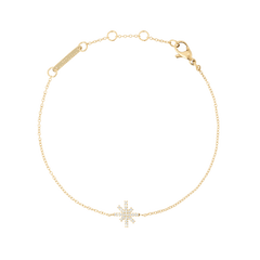 Delicate gold bracelet featuring a star-shaped charm set with white cubic zirconia stones on a fine adjustable chain, designed for a subtle and elegant look.