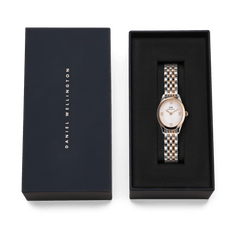 Daniel Wellington Ophelia Mini Two Tone Rose Gold watch presented in its original navy gift box, showcasing the elegant oval face and polished rose gold and silver bracelet.