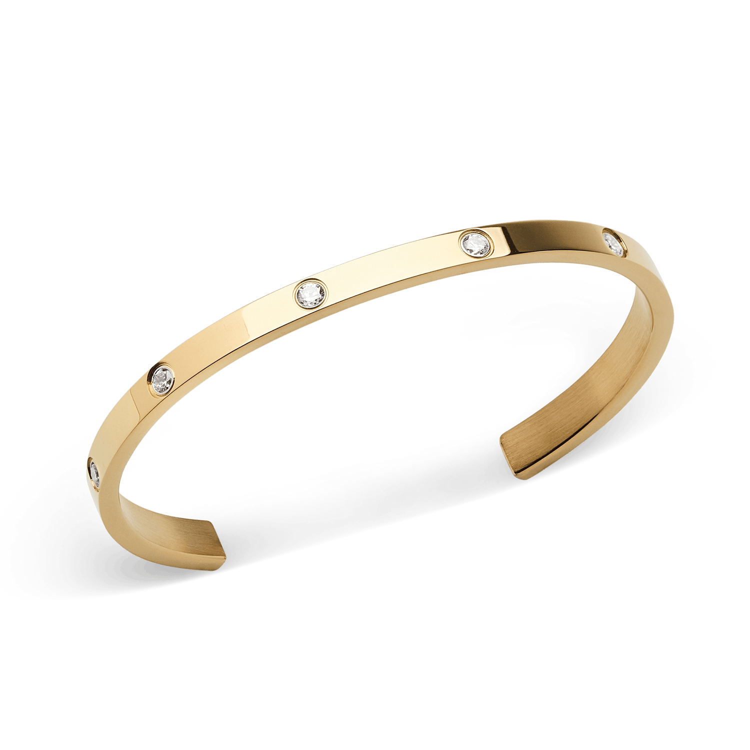 Classic Lumine Bracelet Gold 55mm shown at an angle, highlighting its slim open cuff design, polished gold finish, and eight sparkling cubic zirconia stones set evenly along the band.