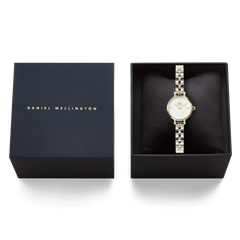 Petite Mini Arch 3-Link Two Tone Gold ladies watch with a gold and silver 3-link bracelet and white dial, elegantly presented in a black Daniel Wellington gift box.