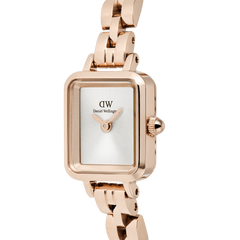 Close-up of the Quadro Mini Arch 3-link White Sunray Rose Gold watch showing the rectangular case, minimalist white sunray dial, and polished rose gold bracelet links.
