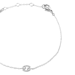 Close-up of the Crystal Zodiac Chain Bracelet Silver showing a delicate silver chain with adjustable sizing rings, a lobster clasp, and a Cancer zodiac charm set with sparkling crystals.