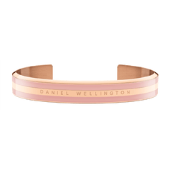 Emalie Bracelet Dusty Rose Rose Gold features a sleek open cuff design with soft pink enamel and rose gold double-plated stainless steel, displaying the Daniel Wellington logo across the front.
