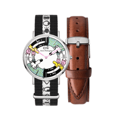 Limited edition Steven Harrington x Daniel Wellington watch set featuring a multicolour printed dial with playful illustrations, a black and white NATO strap, and an additional brown St Mawes leather strap.