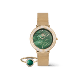 Gold mesh strap ladies watch with an emerald green dial and crystal-set bezel, paired with a matching gold ring featuring a malachite stone surrounded by pavé crystals.