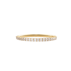 The Mirelle Eternity Ring Gold 1.4 mm features a slim gold band set with a continuous row of sparkling white cubic zirconia crystals, offering a refined and elegant look.