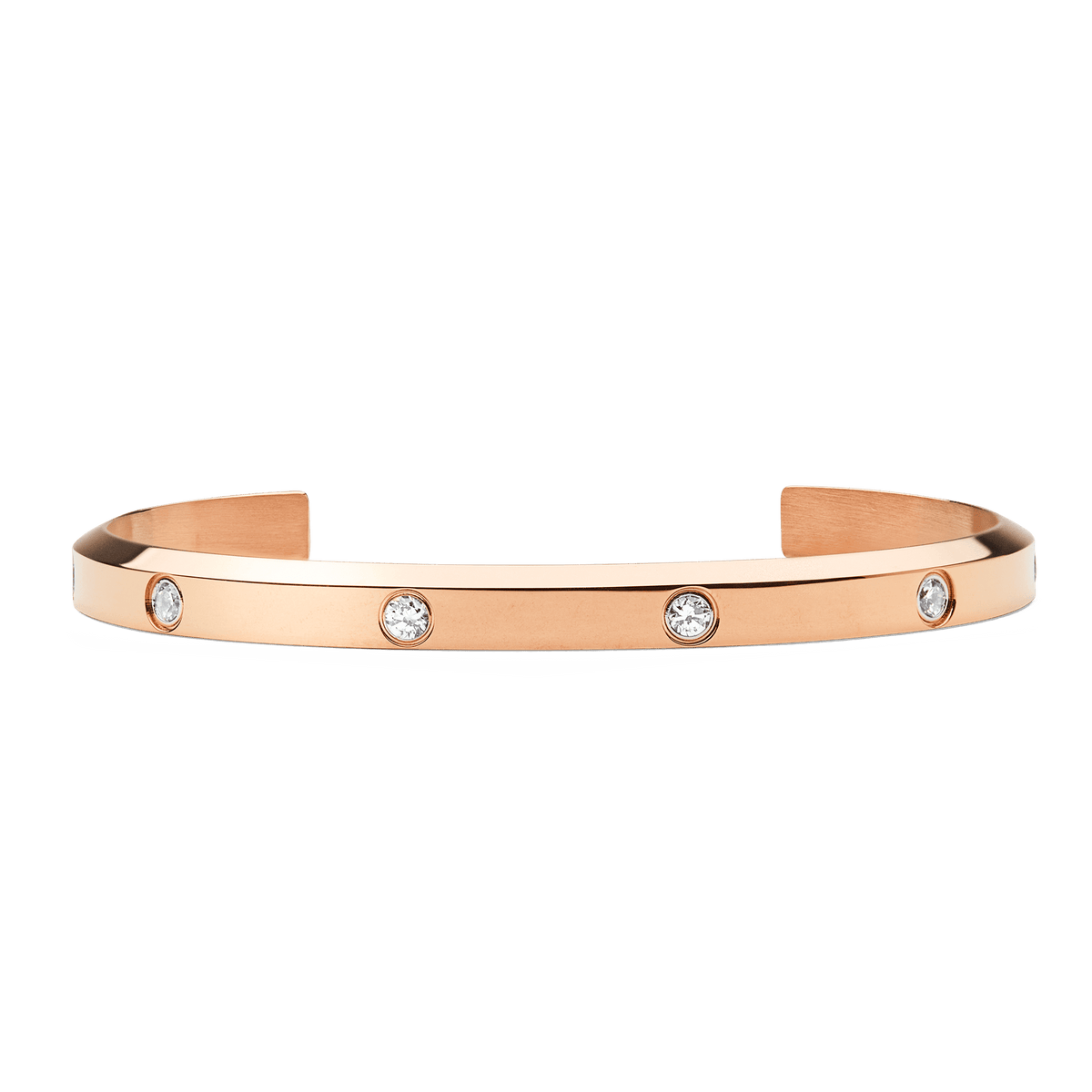 Polished rose gold open cuff bracelet with a minimalist design, featuring eight flush-set cubic zirconia crystals evenly spaced along the band.