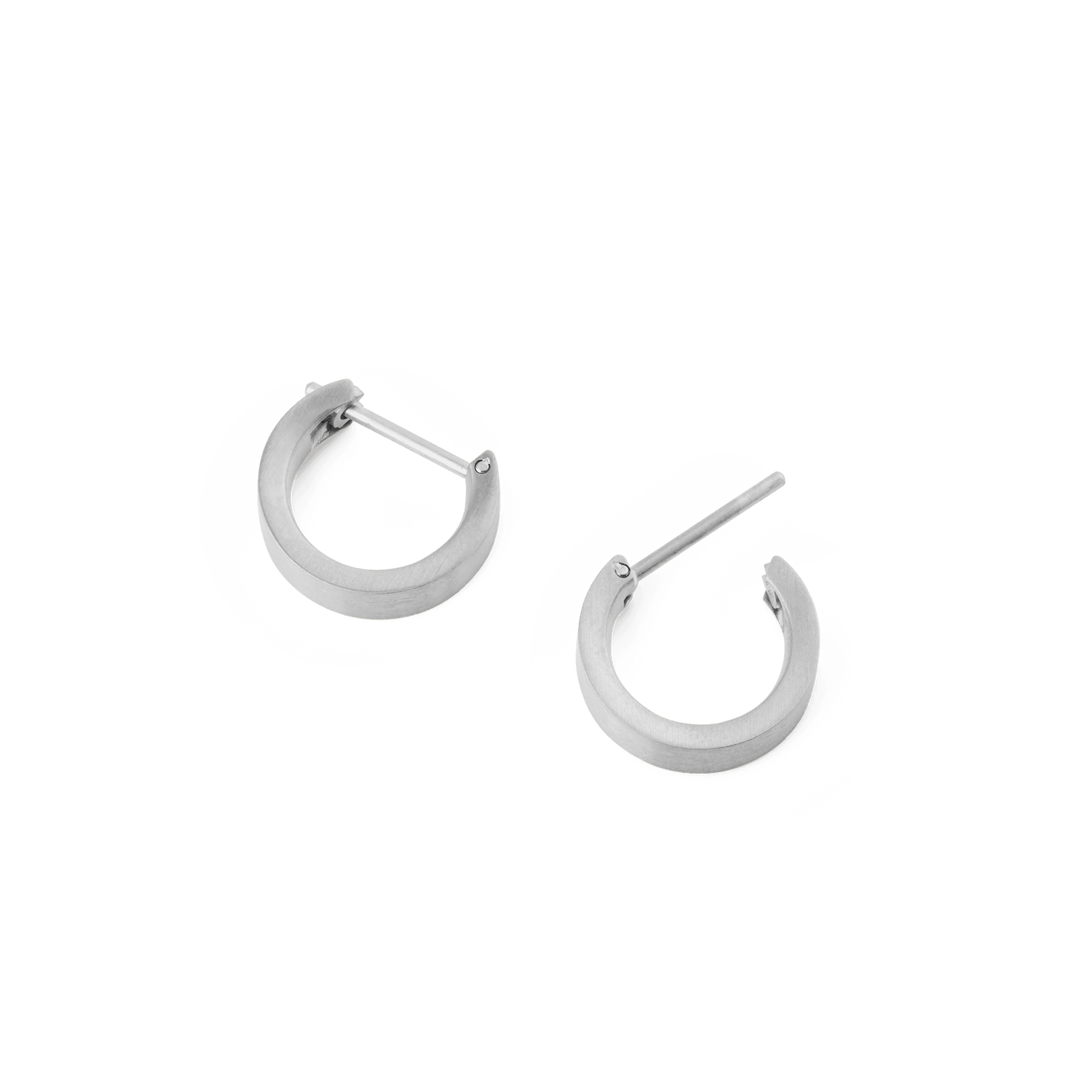A pair of Line Earring Brushed Silver 3.5mm hoop earrings shown open, highlighting their softly brushed silver finish, minimalist design, and secure latch-back posts.